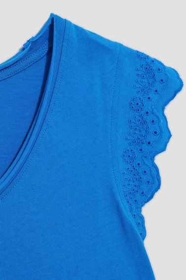 Bluzka z ozdobnym rękawem lazurowa