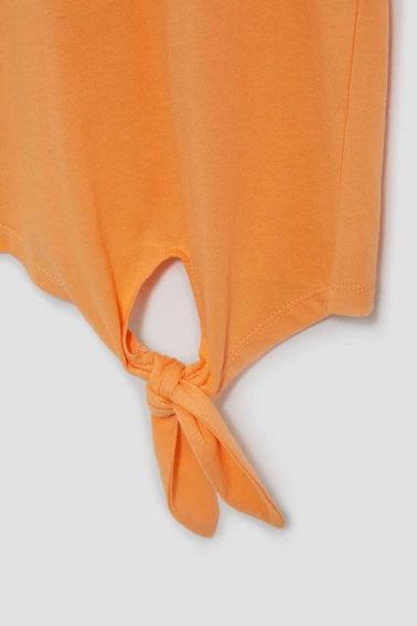 T-shirt z nadrukiem i dekoltem w serek brzoskwiniowy