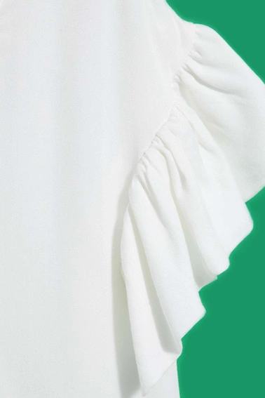 Koszula z falbaną na rękawie