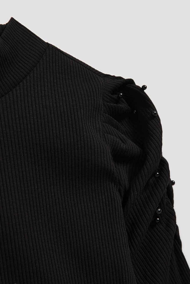 Prążkowana bluzka z bufiastymi rękawami i półgolfem czarna