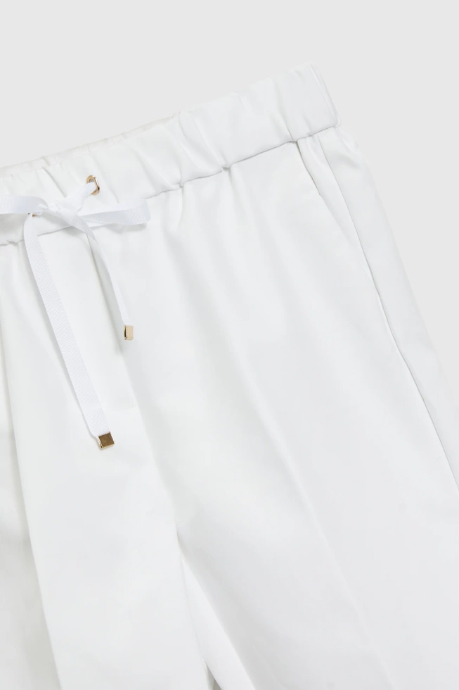 Spodnie z prostymi nogawkami w kant białe