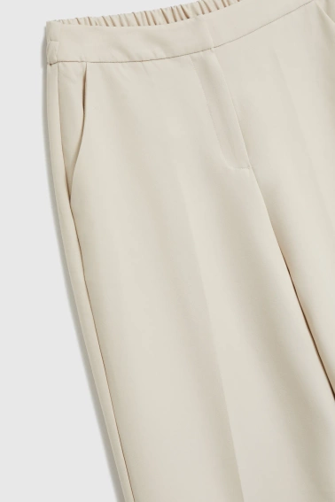 Spodnie z kantem beżowe