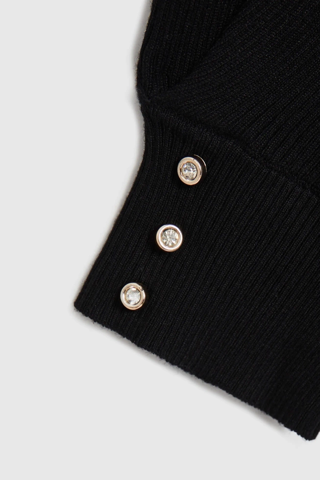 Prążkowany sweter z bufiastymi rękawami czarny