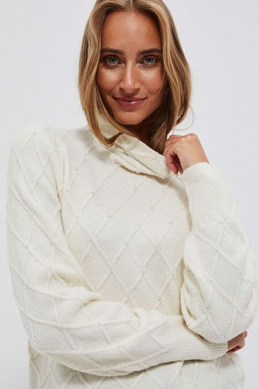 Golf z geometrycznym przeszyciem