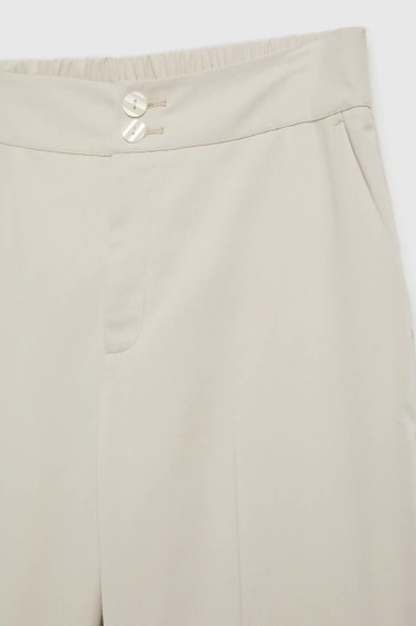 Gładkie spodnie cygaretki beżowe 