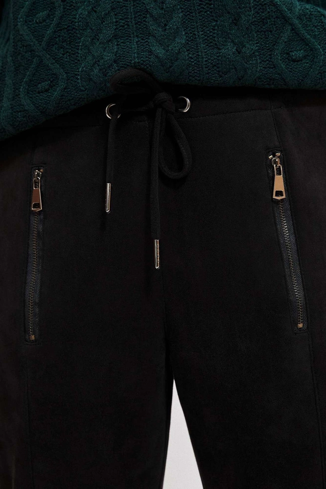 Dresowe spodnie z zapinanymi kieszeniami czarne