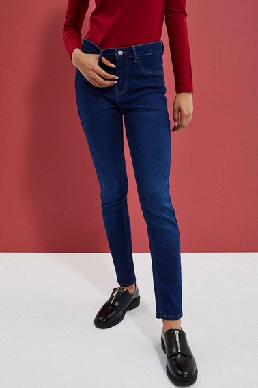 Jeansy skinny zapinane na guzik i zamek ciemnoniebieskie