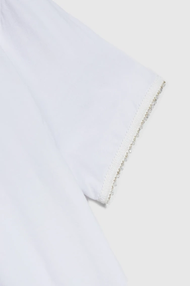 Bluzka z koralikami na rękawach biała